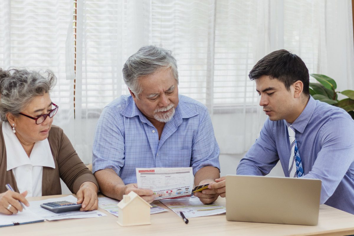 Stressed And Serious Retired Asian Senior Eldery Couple Consult